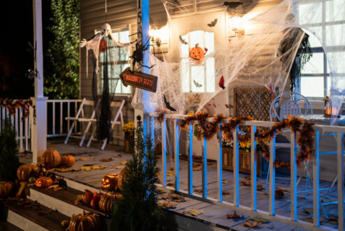Halloween Jack-o-Lantern Pumpkins on a porch stairs